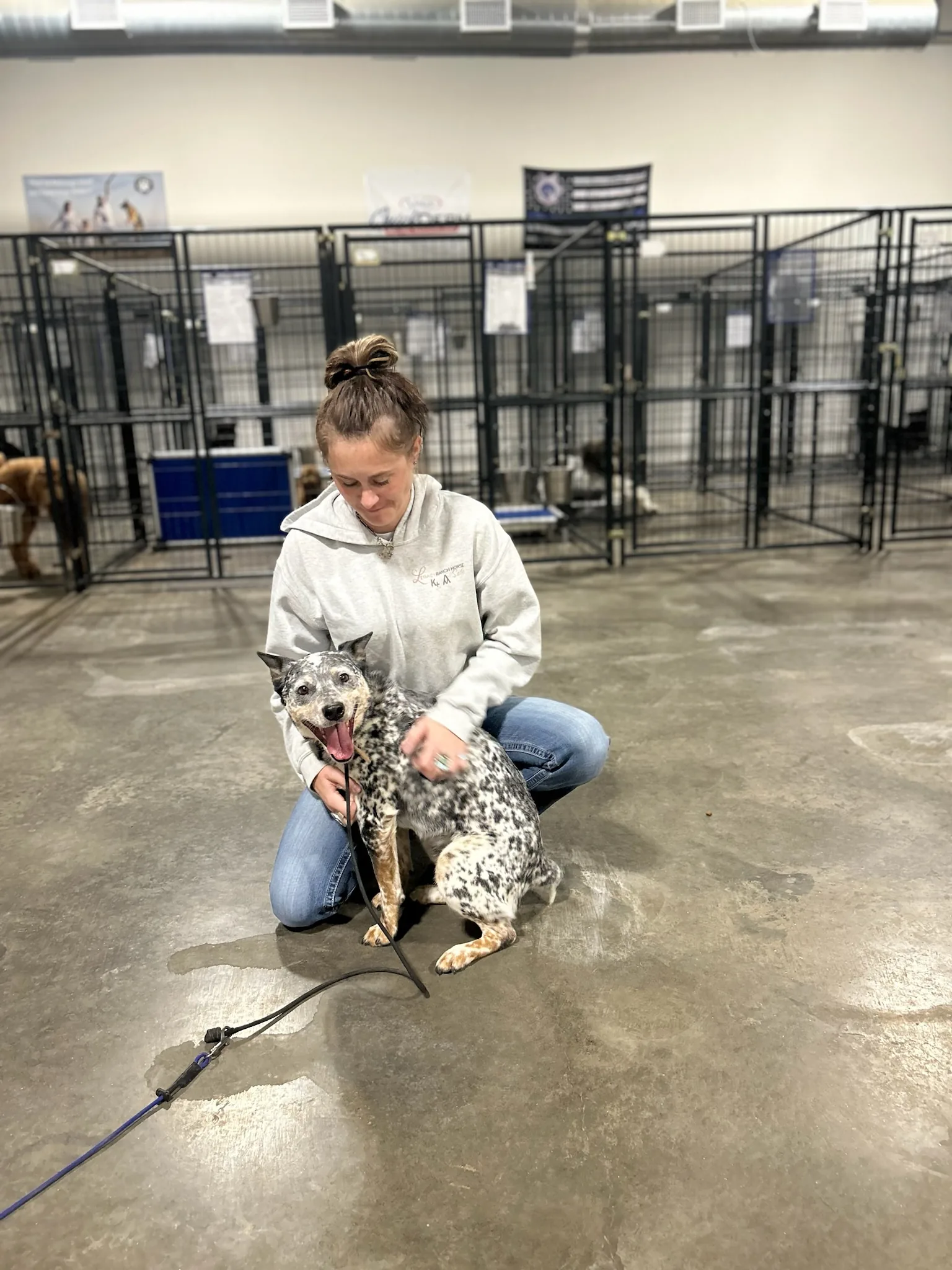 Trainer with dog at the facility
